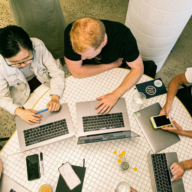 Photo Of People Using Laptops